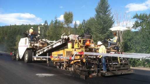 The Montana I-90 rehab project required a total of 165,000 tons of HMA with approximately one-third of that being RAP. Knife River placed three lifts. The bottom lift was three-tenths thick and the top two layers were each 15-hundredths.