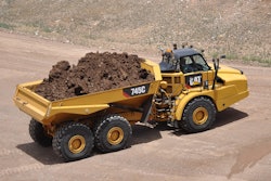 The Cat 745C articulated dump truck is the same width as the 740B, with slightly lower dump-body rails. The bed is 16 in. longer to accommodate a 1.5 tons more payload.