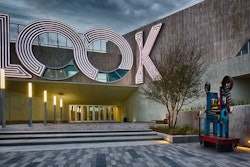 After multiple site cast mock-up panels, the team determined the mix design best suited for the panels, the method of securing the form liner to the casting surface and the means of cutting and abutting the form liner sheets to achieve the desired finish.