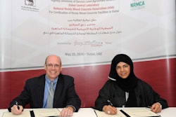 Lionel Lemay, senior vice president of NRMCA (left) and Eng. Hawa Bastaki, executive director of DCL-DM, (right), met for a signing ceremony in Dubai, United Arab Emirates, to establish a cooperative agreement to recognize technical equivalencies of their respective concrete plant and truck certification programs.