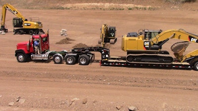 The Caterpillar CX automatic torque converter transmissions provide full power shifts that result in quick acceleration and improved efficiency.