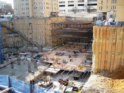 The new Science Building for George Washington University presented big challenges to both the engineer and the contractor. It is nestled into a very narrow space surrounded by three dormitories and the Washington D.C. Metro tunnel.