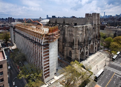 The housing project actually touches the historic church at one point and is located just 40 ft. away from it at other portions of the project, making its design and construction especially challenging.