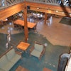 In honor of the 10-year anniversary of the Urban Ecology Center’s first green facility, owners of the facility were looking to create a scale representation of the Lake Michigan shore line in Milwaukee County on their existing concrete floor.