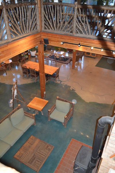 In honor of the 10-year anniversary of the Urban Ecology Center’s first green facility, owners of the facility were looking to create a scale representation of the Lake Michigan shore line in Milwaukee County on their existing concrete floor.