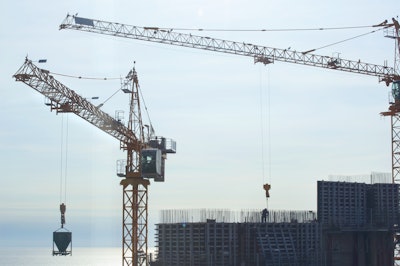 Two Potain MC 205 B tower cranes have been working up to 12 hours a day installing rebar, formwork and machinery to assist in concert pouring for the Alvear Tower in Buenos Aires.