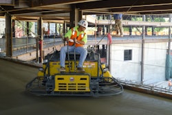 Ricky Ruiz, place and finishing superintendent, Urata & Sons Concrete, Inc., Ranch Cordova, Calif. uses a Wacker Neuson CRT 48-35V ride-on trowel on the new Sacramento, Calif. arena. The light weight machine was a perfect fit for the multi-level arena.