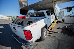 ASRC Energy Services loads a 2015 Chevrolet Colorado on a Shorts 330 cargo aircraft to fly it beyond Alaska's roads to employees managing oil-field construction on the North Slope.