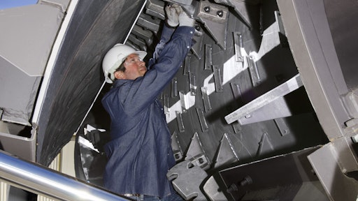 Mixing tip wear needs to be evaluated periodically or when blending quality of the HMA appears inadequate. These mixing tips are reversible to allow increased service life. Drum buildup removal should be performed in conjunction with rotating mixing tips (paddles).