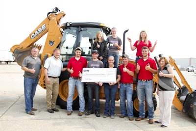 Students and staff of Southeastern Community College with the newly donated Case 580N backhoe.