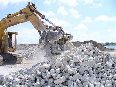 Pulverizer attachments such as the Kenco concrete pulverizer feature powerful toothed jaws that can break concrete down into smaller pieces for easier processing.