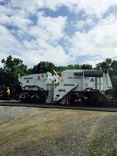 The modified cold planer used on Highway 243 had a 1.5-foot wider frame and no conveyors.