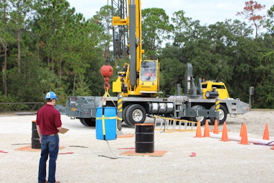 The slalom challenge requires weaving the barrel through a course. This operator is shown competing at Crane Institute’s 2013 Skills Competition held near Orlando, FL.