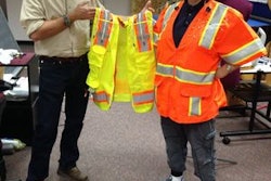 Dr. Tom Martin and Ph.D. student Kristen Hines with the newest prototype of the InZoneAlert construction vest.