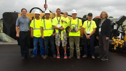 The crew from B&T Drainage with Vermeer's Jason (far left) and Mary Andringa (far right).