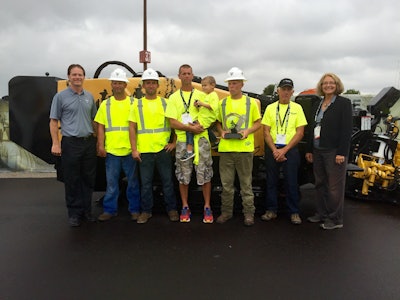 The crew from B&T Drainage with Vermeer's Jason (far left) and Mary Andringa (far right).