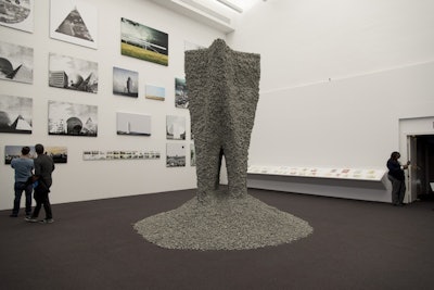 Gramazio Kohler Research (GKR) has created a process using a 3D printing extruder, rocks, string and a smart design that it thinks is a step towards a concrete alternative. The process jams rocks together with algorithmically placed string.