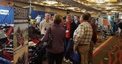 Attendees to the Northwest Rental Conference in Seattle browse the exhibit hall, which featured 80-some booth spaces including everything from earthmoving equipment and aerials to general tools and supplies.