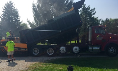 Barrett Paving Materials out of Dayton supplied the mix to Cincinnati Asphalt free of charge. They installed about 45 tons of ODOT #448 surface asphalt all without accepting a dime from Roush.