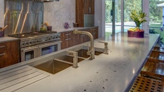 Jake Brady, owner/designer of Jake Brady Concrete By Design (www.JakeBradyConcrete.com) created this stunning concrete countertop for a kitchen.