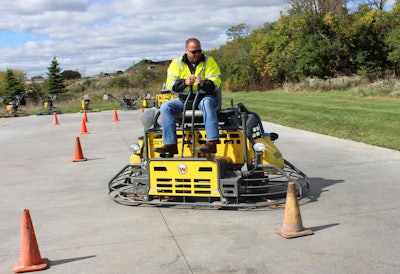Matt Basky, concrete product solution specialist for Wacker Neuson, tests a new course layout for the 2016 Trowel Challenge competition taking place at World of Concrete, February 2-5, 2016 in Las Vegas. This year’s course has been redesigned to test operators’ precision troweling skills as well as speed.