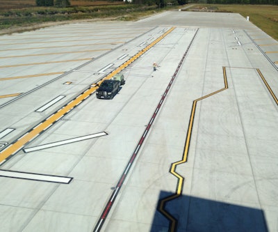Project cost was estimated around $30 million with the striping subcontract around about $60,000 for Brian Boatner, president of Roads & Runways, and his son Ben. They completed 70,000 sq. ft. of striping in a short two week timeframe.
