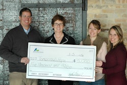 From left to right: Carl Wistreich, President and CEO of AC Business Media; Barb Endl, Executive Director, Tomorrow's Hope; Kayla Brown and April Van Etten, representing the AC Business Media employees