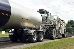 In Monroe County, MI, full depth reclamation, engineered asphalt emulsion is injected into reclaimed materials as they are mixed.