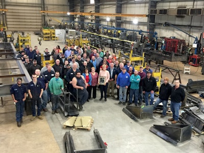 Astec Mobile Screens’ day shift poses with the award given by Astec Industries for a superior safety rating in 2015.