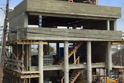 The top floor of the house is where the master bedroom is located. Three steel containers were lifted into position to form the bedroom walls. The doors at either end can be opened to view the ocean and allow breezes to flow through.