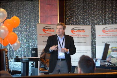 DSSG CEO and President Curt Thompson addresses guests at the company's first annual membership meeting at The Palms Hotel during the World of Concrete trade show.