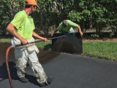Some contractors prefer to edge using a spray wand and a blocker board. Spraying can offer a clean edge, but contractors must be very mindful not only of overspray, but also of the blocker board and the sealer that accumulates on it. It can become tricky moving the board from one location to another without having sealer drip on to the surfaces you are trying to protect. Spraying is also susceptible to the effects of wind.