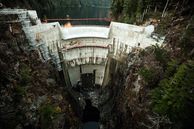 Barnard Construction Company raised the then-145-foot-tall Blue Lake Dam by 83 feet to its maximum geotechnical height and built a 15.9 megawatt powerhouse. Construction was undertaken on a fast-track schedule under the intense scrutiny of a heavily-invested public, reliant on the dam for power and on Blue Lake for drinking water.