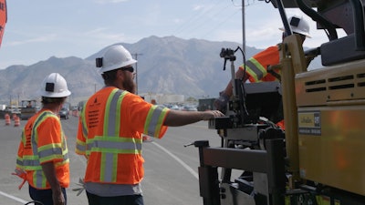 Workers with WorkTrax Units Watching Traffic 56e7107126711