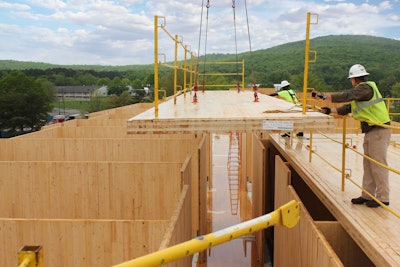 Made of several layers of pressed lumber board stacked in alternating directions, CLT offers builders maximized strength and durability with added sustainability and conservation benefits.
