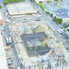 Four truck-mounted boom pumps from Dudley Concrete Pumping’s fleet placed 3,100 cubic yards of concrete for a logistically demanding pour.