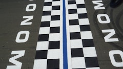 The Start/Finish line is the last item striped; the racetrack itself is bordered with 5-in. yellow lines on both sides of the track, which amounts to four miles of striping all done with a walk-behind unit.