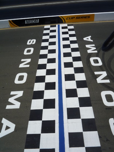 The Start/Finish line is the last item striped; the racetrack itself is bordered with 5-in. yellow lines on both sides of the track, which amounts to four miles of striping all done with a walk-behind unit.