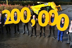 Loadall MD Ian Pratt (extreme left) and Loadall Operations Director Paul Grys (extreme right) join employees (l-r) Ian Vickery, Cliff Ferrie, Mick Smith, Dave Bailey, Nick Miller, Paul Stockley and Richard Jenkinson in celebrating the 200,000th Loadall milestone.