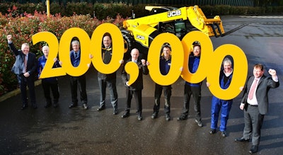 Loadall MD Ian Pratt (extreme left) and Loadall Operations Director Paul Grys (extreme right) join employees (l-r) Ian Vickery, Cliff Ferrie, Mick Smith, Dave Bailey, Nick Miller, Paul Stockley and Richard Jenkinson in celebrating the 200,000th Loadall milestone.