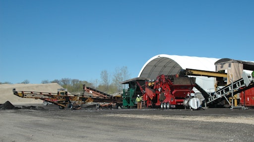 Through shingle grinding, Wolf Paving has recycled 85,000 tons of shingles in six years, reducing their need for 85,000 barrels of oil and keeping 140 cu. yds. of shingle material out of landfills.
