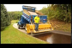 SealMaster R-1 Aggregate Chip Spreader on Road