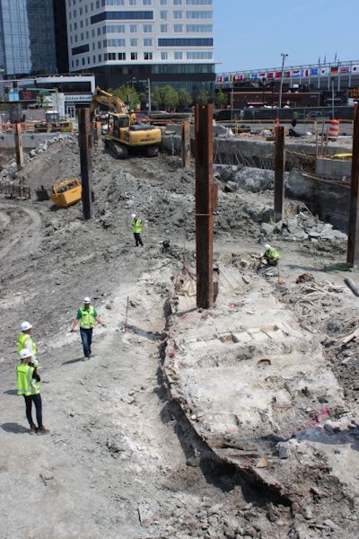 Fifty-foot wooden cargo vessel discovered while excavating for Skanska's 121 Seaport development was carrying barrels of lime and sank, likely because of fire, near Boston Harbor sometime between 1850 and 1880.