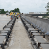 Poured section with forms in place prior to gang-stripping.