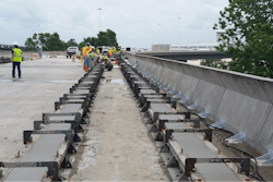 Poured section with forms in place prior to gang-stripping.