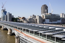 The 922-foot bridge was updated in 2012 to add a 4,400 solar panel roof which could generate 900,000 kilowatt hours of electricity annually and reduce over 500 tonnes of carbon dioxide each hear.