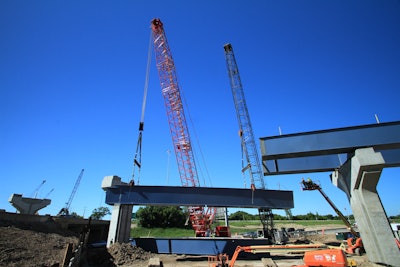 On the site, Lunda is using the MLC300 to lift and set large tub girders that will support a ramp from Highway 45/I-894 northbound to I-94 westbound. The heaviest tub girders weigh approximately 68.5 tons. Lifts are reaching up to 60 ft.