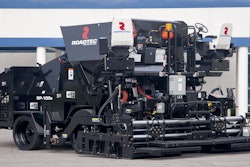 The SP-100e accepts the hot-mix asphalt (HMA) at the top of the machine, where gravity feeds the material through flow gates directly to the auger from the cone-shaped mass flow hopper.