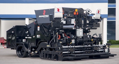 The SP-100e accepts the hot-mix asphalt (HMA) at the top of the machine, where gravity feeds the material through flow gates directly to the auger from the cone-shaped mass flow hopper.