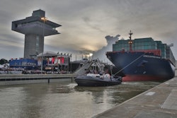 The inaugural transit of the Panama Canal Expansion has begun, as COSCO Shipping Panama enters the Agua Clara Locks.